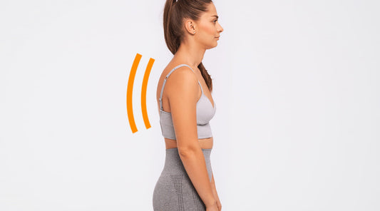 Slouching woman standing, representing Etalon's survey finding on posture and chronic pain.