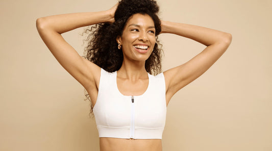 Woman wearing white Etalon posture bra, designed for everyday comfort and back support. 